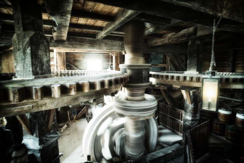 gears and wheels spinning fast inside a windmills in Zaanse Schans near Amsterdam