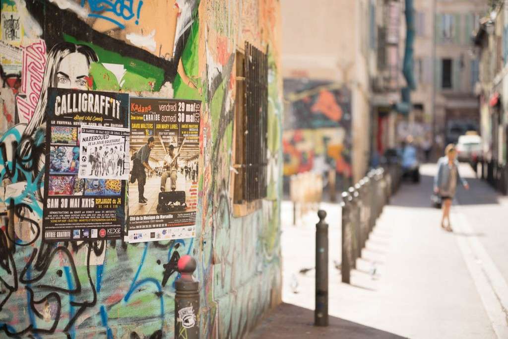 tags and graffiti in a colourful street in Marseilles